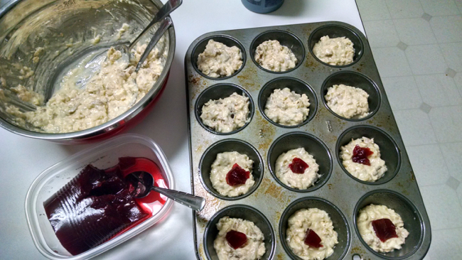 Putting the cranberry sauce in the Thanksgiving Leftovers Savory Muffins